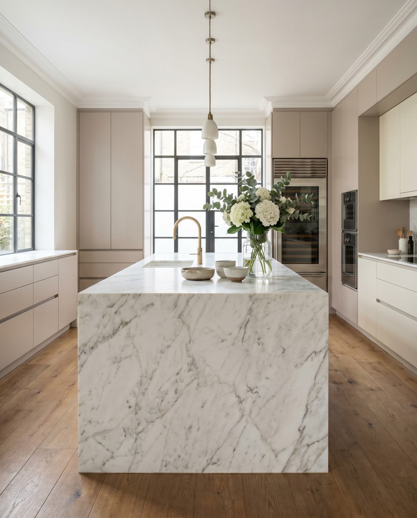A marble kitchen with brass fittings